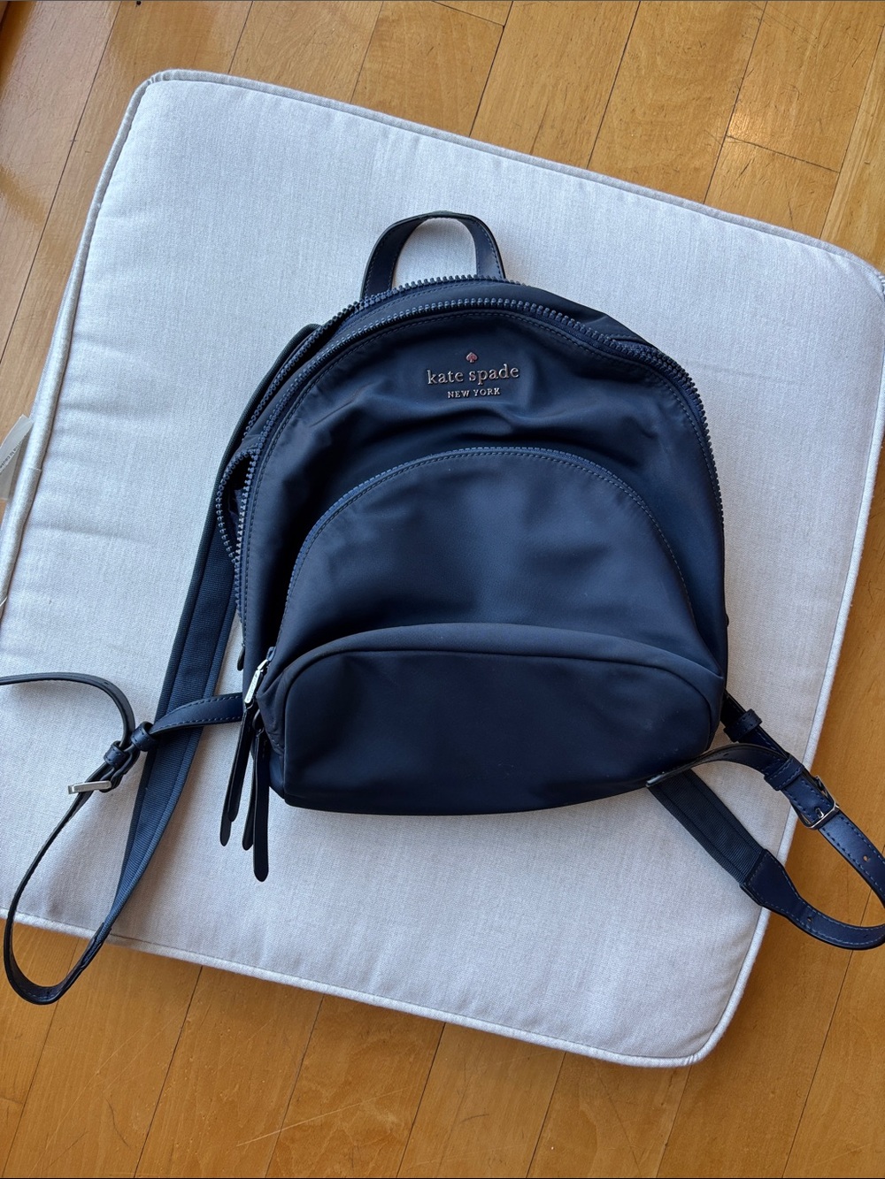 kate spade navy small backpack with front pocket
